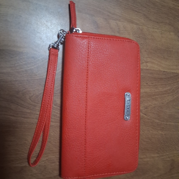 Nicole Miller Handbags - Nicole Miller Orange Wristlet Clutch